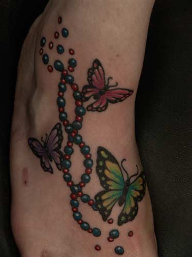 Tattoos - Anthony Lawton - butterfly with dna