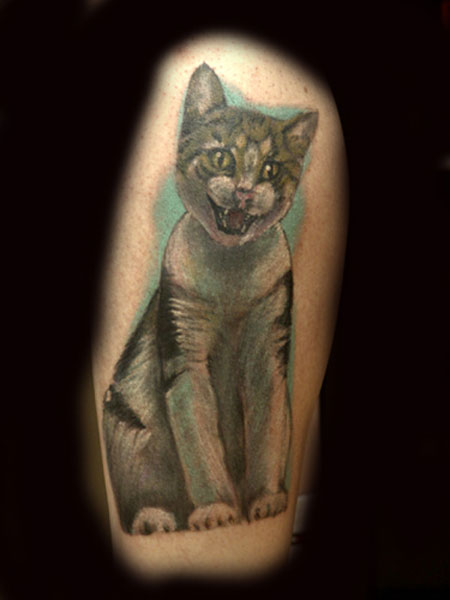 Anthony Lawton Tattoos a cat called fish