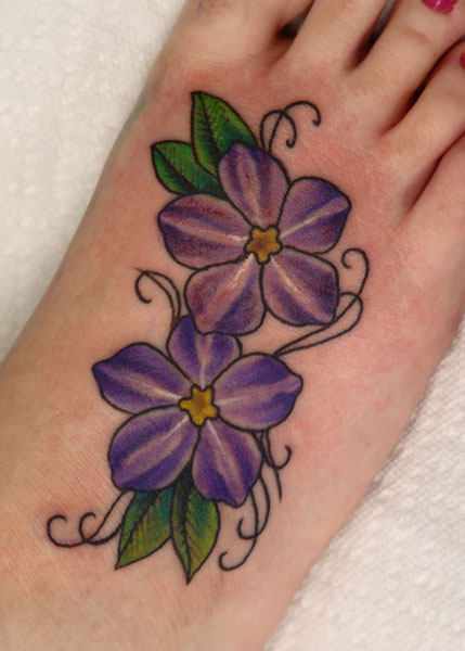 tattoos on foot. Flower tattoos Tattoos foot