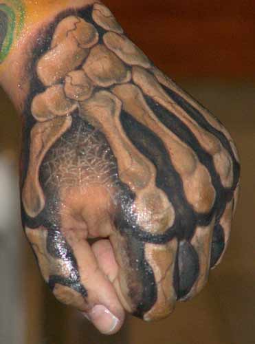 Tattoos Biker tattoos bone hand click to view large image