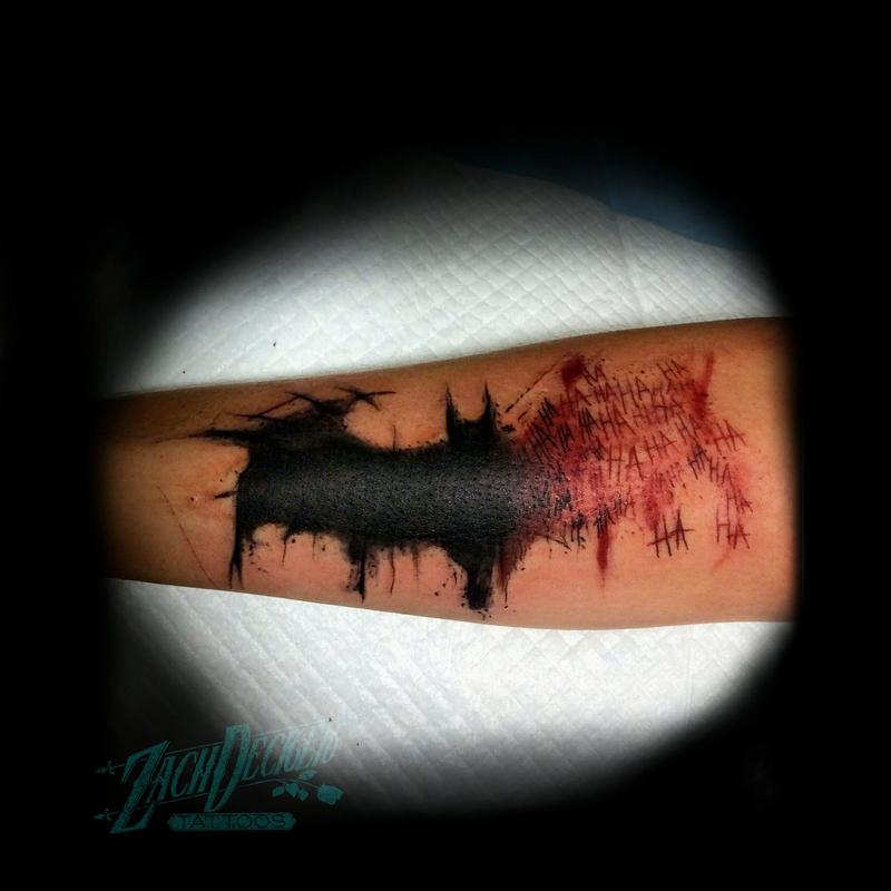 batman symbol arm tattoos