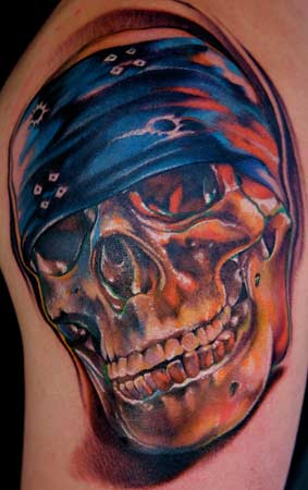 The skull tattoos cover a