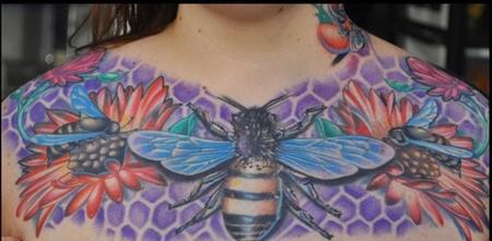 Aric Taylor The Dark Horse - colorful bee chest piece with flowers tattoo