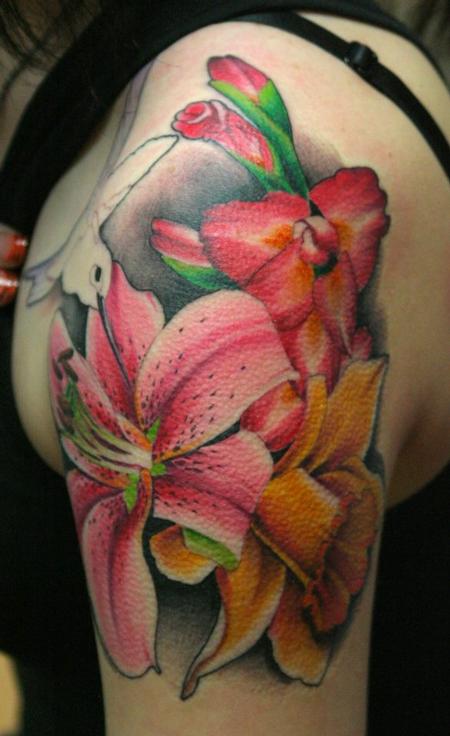 Tim Mcevoy - realistic assorted color flowers tattoo