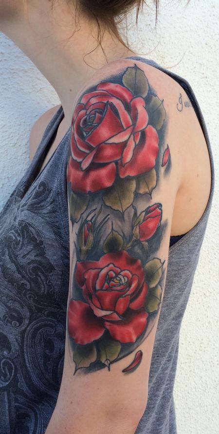 Mike Riedl - Traditional color rose half sleeve tattoo. Mike Riedl Art Junkies Tattoo 