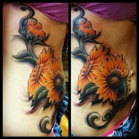 Tim Mcevoy - colored sunflower cover up tattoo