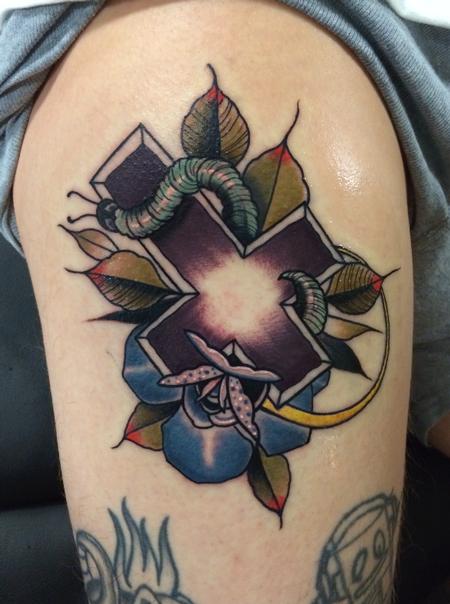Mike Riedl - Traditional color rose with a cross in the center tattoo, Mike Riedl Art Junkies Tattoo