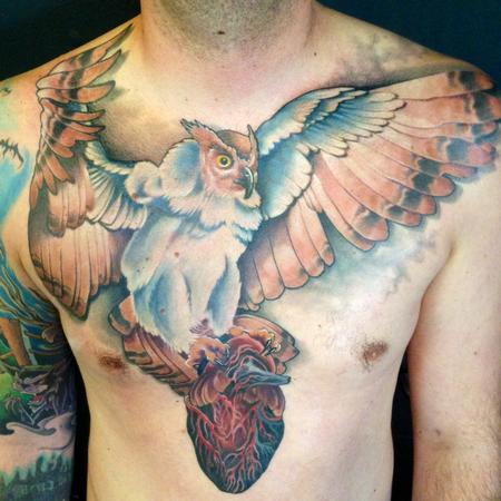 Tim Mcevoy - Realistic color owl with heart in feet tattoo, Tim McEvoy Art Junkies Tattoos