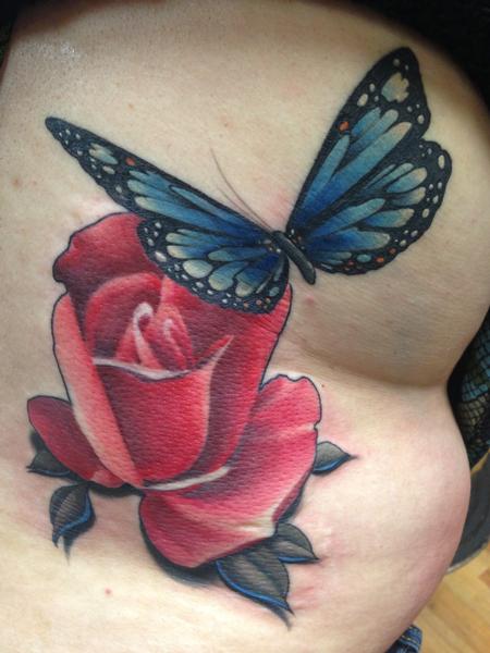 Tim Mcevoy - Realistic color rose with butterfly tattoo. Tim McEvoy Art Junkies Tattoo