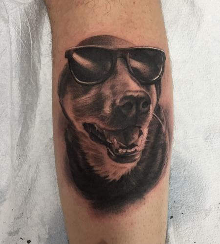 Ryan Mullins - Realistic black and gray portrait of dog in sunglasses tattoo. Ryan Mullins Art Junkies Tattoo