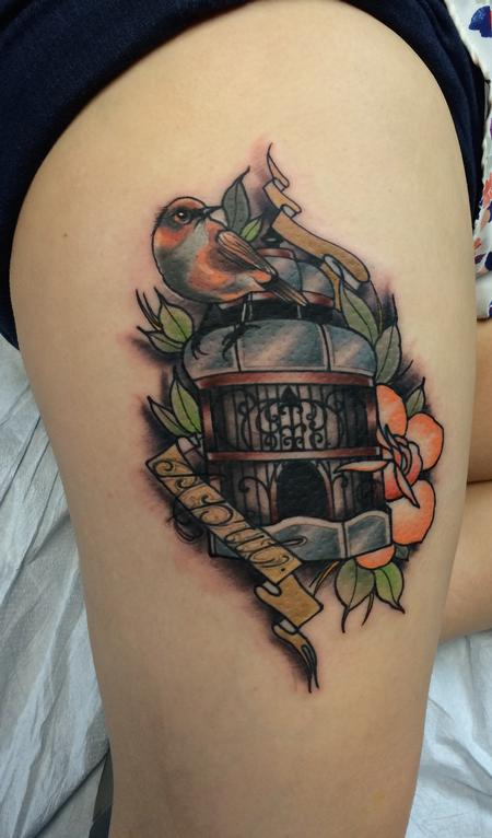 Mike Riedl - Traditional color bird cage with bird and name tattoo, Mike Riedl Art Junkies Tattoo.