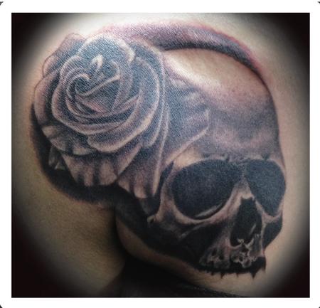 Scott Grosjean - Black and gray skull with rose tattoo. Scott Grosjean Art Junkies Tattoo