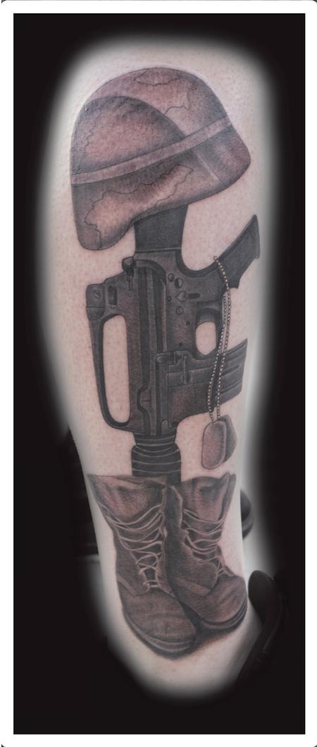 Scott Grosjean - Realistic black and gray military boots,gun, and helmet tattoo. Scott Grosjean Art Junkies Tattoo