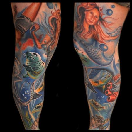 Aric Taylor The Dark Horse - colorful under water leg sleeve tattoo