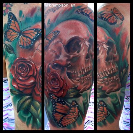 Brent Olson - realistic color skull with roses and butter fly tattoo. Brent Olson Art Junkies Tattoo