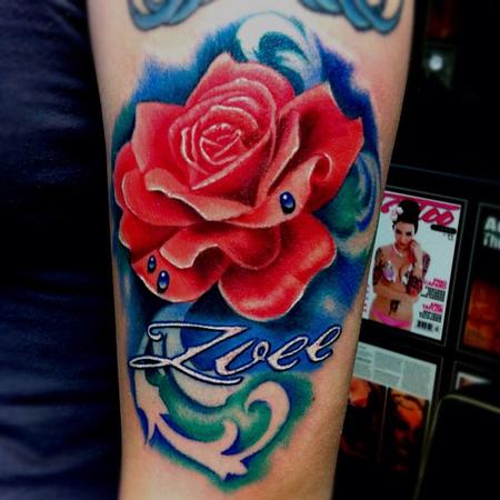 Aric Taylor The Dark Horse - colorful and bright realistic rose tattoo