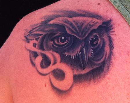 Mike Riedl - Black and Grey realistic owl portrait tattoo