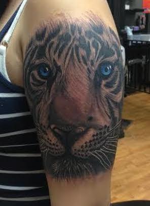 Tattoos - Black and gray realistic tiger with blue eyes tattoo, Scott Grosjean Art Junkies Tattoo - 100361