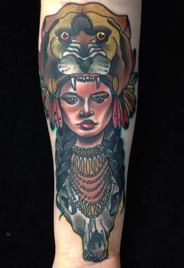 Gary Dunn - Traditional native girl with lion on head tattoo, Gary Dunn Art Junkies Tattoo