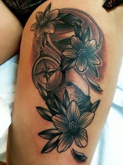 Frichard Adams - Black and Gray traditional compass with flowers tattoo. Frichard Adams Art Junkies Tattoo 