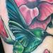 Tattoos - colored humming bird with crimson mandevilla flowers tattoo.  - 68017