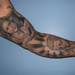 Ray's black and grey religious sleeve Tattoo Thumbnail
