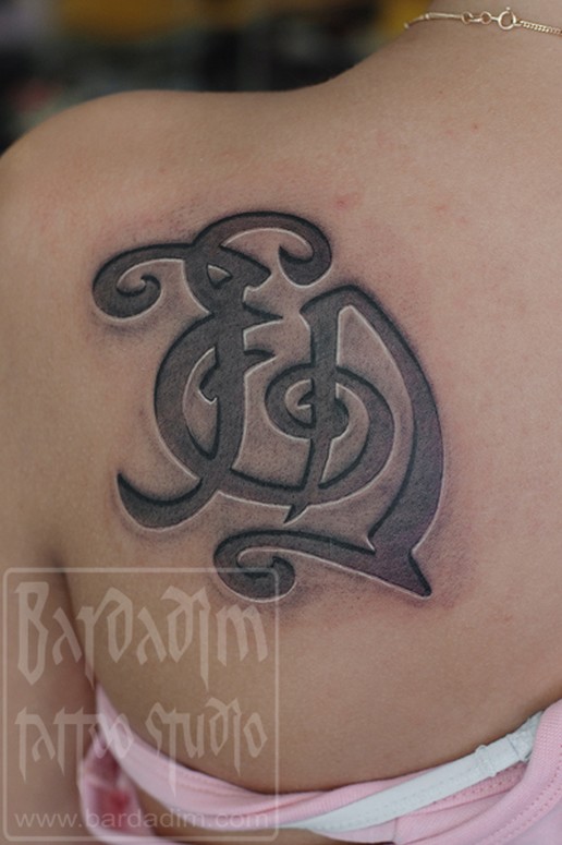 engraved monogram tattoo by george bardadim tattoonow engraved monogram tattoo by george bardadim tattoonow
