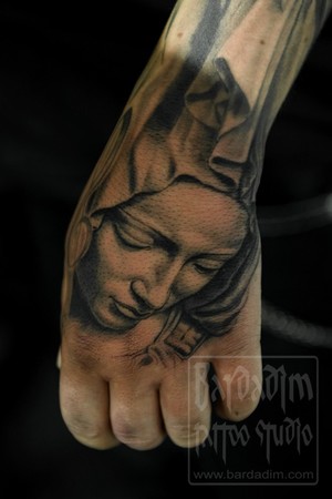 Angel 39s face black 39n 39 grey wrist tattoo made on Hamburg tattoo convention