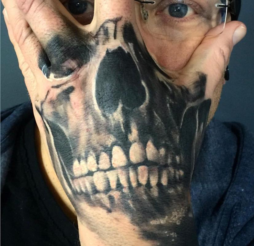 skull hand tattoo shop duluth mn by kyle grover tattoonow skull hand tattoo shop duluth mn by kyle grover tattoonow