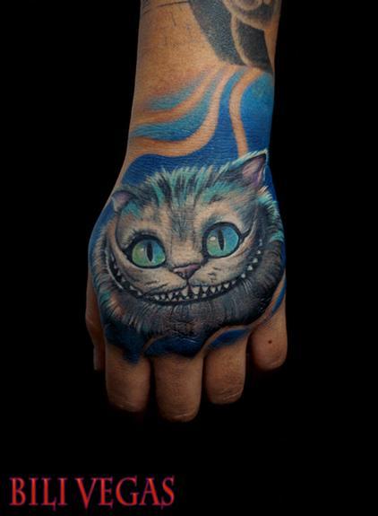Bili Vegas - Cheshire cat hand tattoo