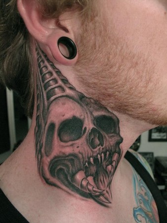 Bob Tyrrell Skull on neck tattoo