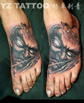 Tattoos - Face on foot - 32144