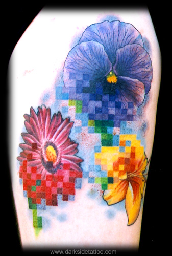  For anyone not familiar with these pieces the pixels are tattooed and not 