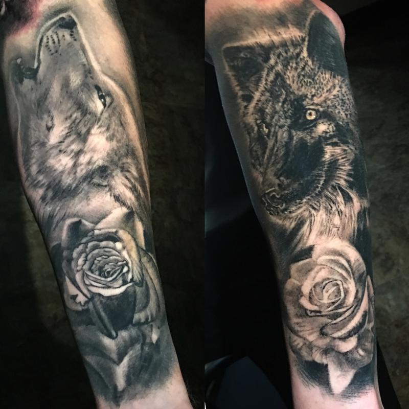 black and grey wolves and roses tattoo by Misty Locket