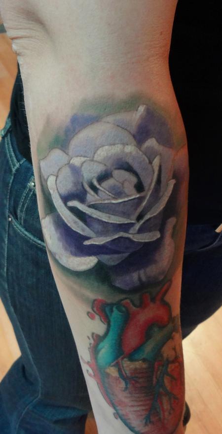 Ian Robert McKown - rose arm tattoo