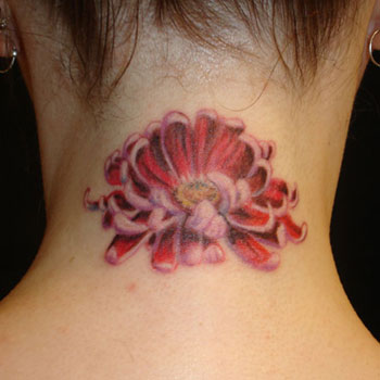 flower tattoo on back of neck