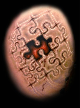 Puzzles on Tattoos Orrin Hurley Page 1 Puzzle Wound