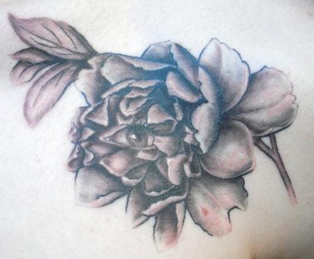 black and grey flower tattoo