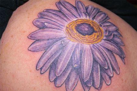 Galen Luker gerber daisy tattoo