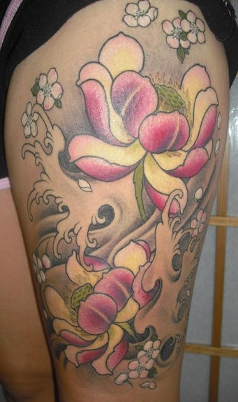 asian flower tattoo. Flower leg sleeve tattoo