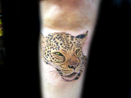 Angela Leaf - realistic color leopard tattoo