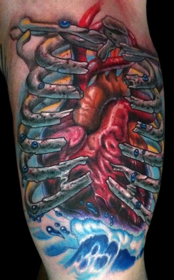 Real fun custom piece of a human heart incased in a broken ribcage