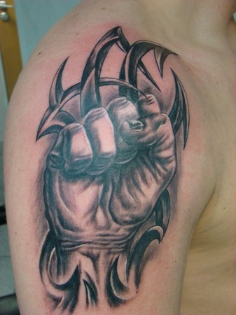 Daniel Fist tribal tattoo