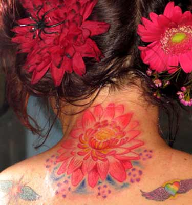 Looking for unique Michele Wortman Tattoos Lotus FLower on back of Neck