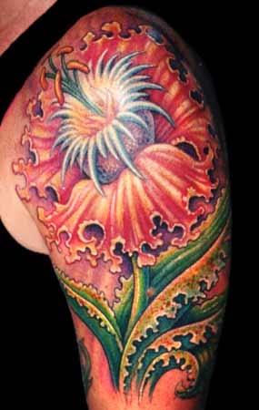 Guy Aitchison flower tattoo