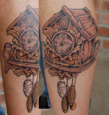 Some birds hanging around a cuckoo clock It's going to be a big leg sleeve