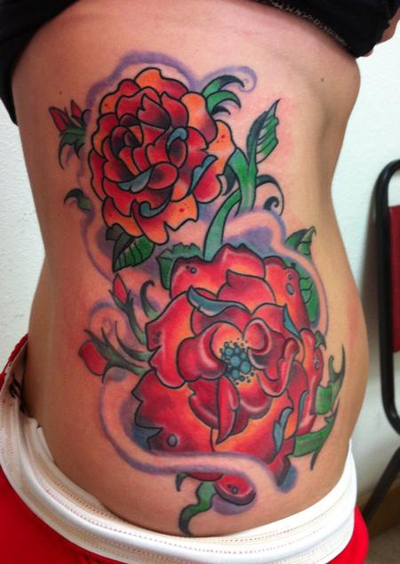 devoted ink tattoos flower abstract glowing flower tattoo side