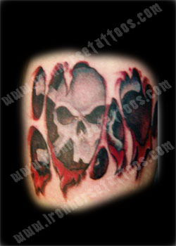 Tattoos - Skin Rips tattoos - Skull Peaking Through