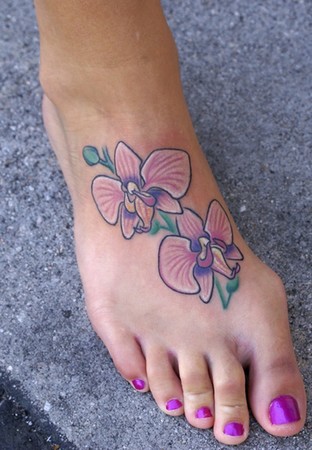 small flower tattoos on foot. Tattoos. Tattoos Flower. Foot Orchid Tattoo