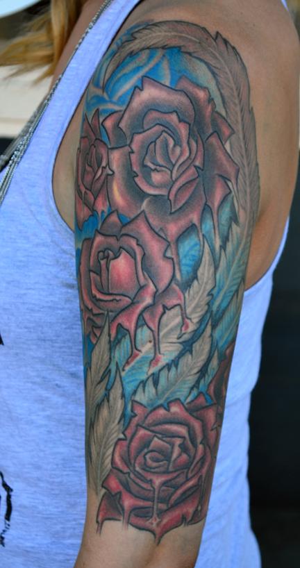 Jeff Johnson Wing and Roses Tattoo